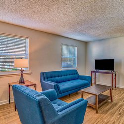 living room at Towne West Manor features spacious two & three bedroom apartment homes