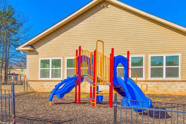 playground at Towne West Manor features spacious two & three bedroom apartment homes