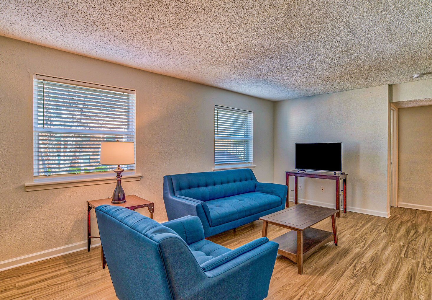 living room at Towne West Manor features spacious two & three bedroom apartment homes